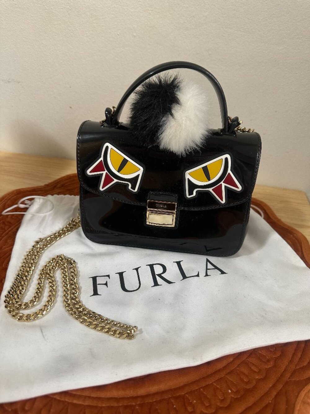 Furla Candy Jungle Mini Bag – Black Jelly Bag w/ Eye & Fur Pompom